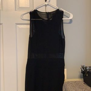 A black romper/jumpsuit.
